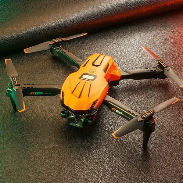 Drone D88 z Podwójnymi Kamerami, Inteligentne Unikanie Przeszkód, Składany z Ochroną Antykolizyjną, GPS-less, Hovering Optical Flow, Ładowanie USB, RC Quadcopter dla Początkujących, Lekki FPV Racing Drone dla Dorosłych i Dzieci, Prezent na Urodziny/Swiatki (Czarny/Pomarańczowy) - Idealny do Fotografii Lotniczej & Wyścigów FPV, Trwała Konstrukcja, Design Elegancki, dla Miłośników Technologii - obrazek 7